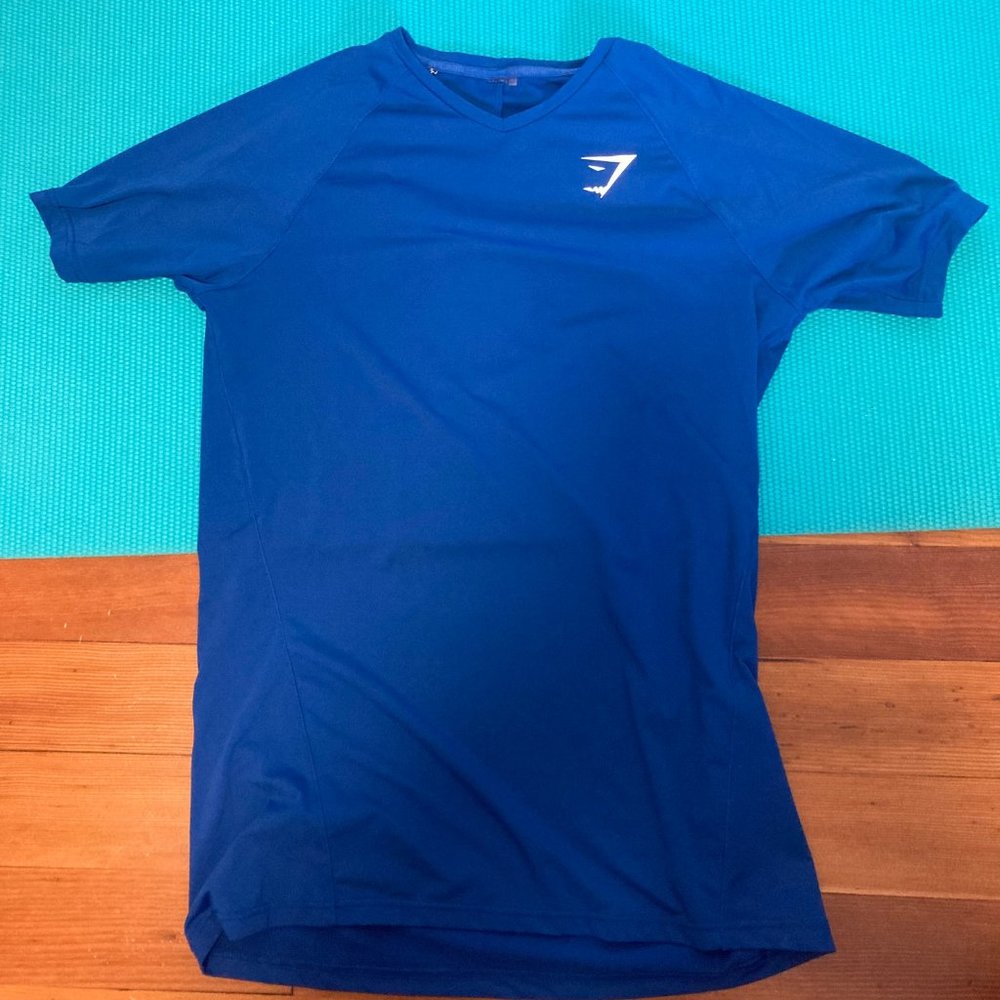 Gymshark Blue Dri fit workout shirt (shallow v neck)